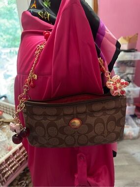 Coach Brown Signature Crossbody Wristlet with Gold Chain and Pink Floral Charm